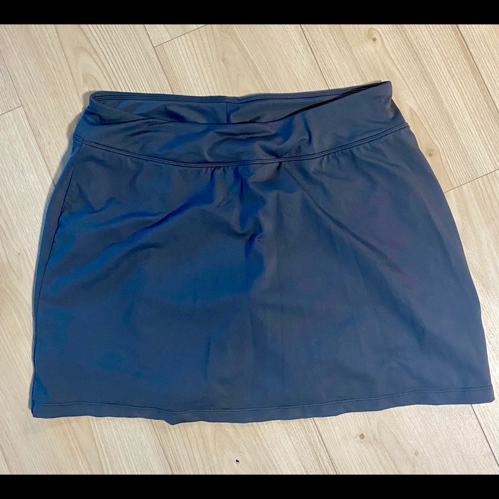 Women’s L Title Nine Buttah Skort. Never worn. Grey. Wears more like an XL